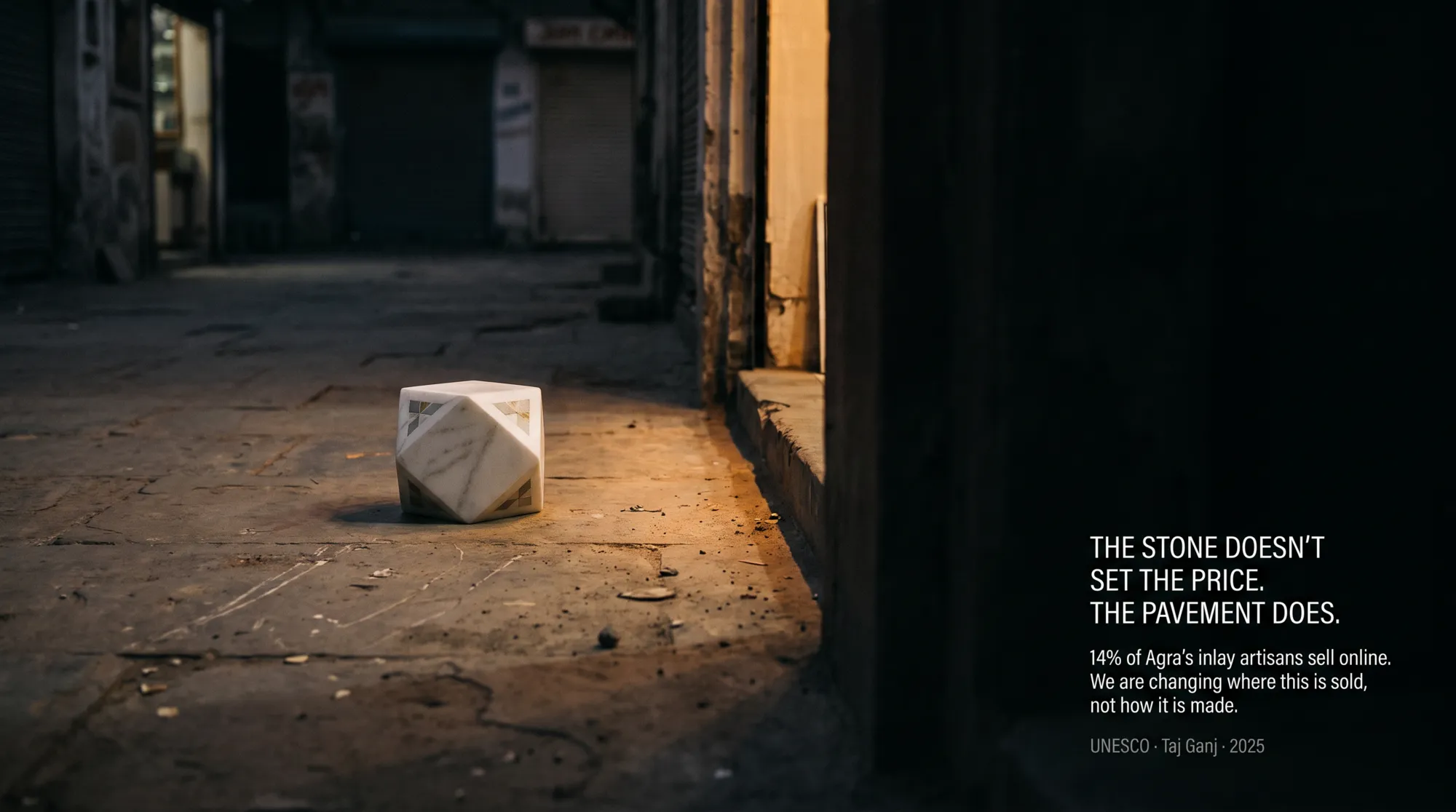 A marble inlay piece in a dark Agra lane